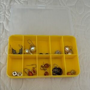 Yellow Jewelry Organizer Box with 19 pairs of costume jewelry earrings
